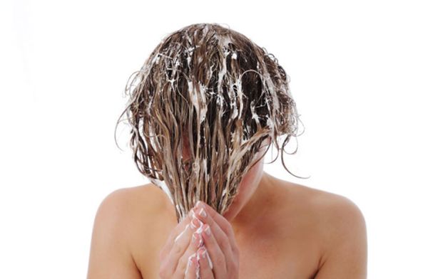 Woman-With-Yogurt-And-Coconut-Oil-Hair-Mask