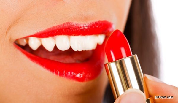 lady applying lipstick