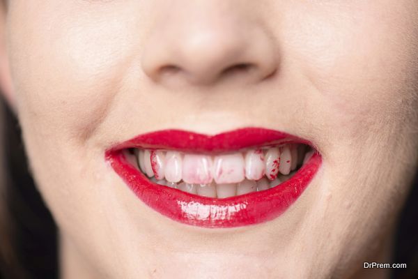 close up mouth and teeth with lipstick