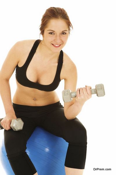 Woman in black with weights