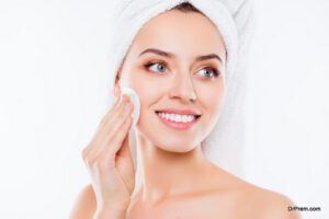 woman using makeup wipe